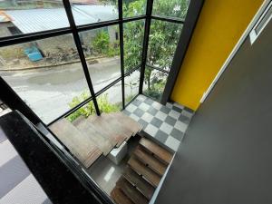 an overhead view of a bench in a building at The Endless Bangtao Residence LOFT 7 in Bang Tao Beach