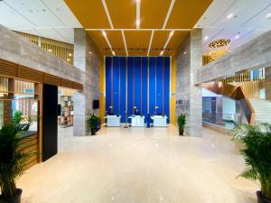 Ο χώρος του λόμπι ή της ρεσεψιόν στο Holiday Inn Express Tianjin Airport East, an IHG Hotel
