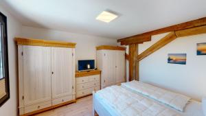 Postel nebo postele na pokoji v ubytování Speicher Residenz Barth E3 App10