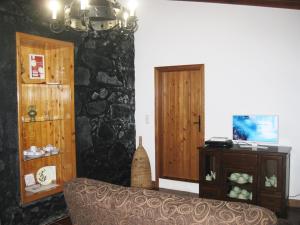 Телевизор и/или развлекательный центр в Casa Santana