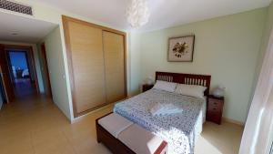 Łóżko lub łóżka w pokoju w obiekcie Casa Espliego M-A Murcia Holiday Rentals Property