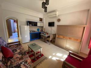 a living room with a couch and a table at Villa 22 in Dahab