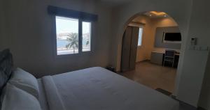 Rúm í herbergi á NASEEM HOTEL