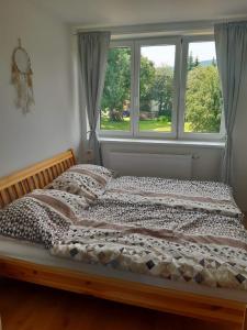 Postel nebo postele na pokoji v ubytování Apartmán u Kunštátského mlýna