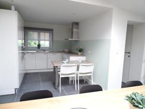 Kuchyň nebo kuchyňský kout v ubytování Vakantiewoning Mèzik