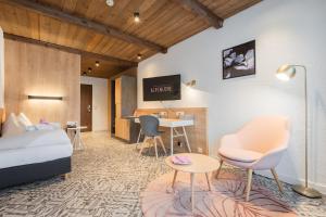 Ein Bett oder Betten in einem Zimmer der Unterkunft Alpenlove - Adult SPA Hotel