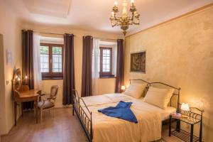 Vila Radolca apartments & rooms tesisinde bir odada yatak veya yataklar