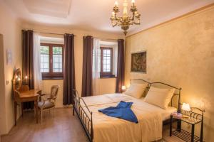 Postel nebo postele na pokoji v ubytování Vila Radolca apartments & rooms