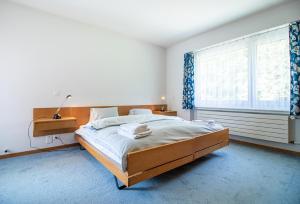 Postel nebo postele na pokoji v ubytování Utoring 412 by Arosa Holiday + 18 fotografií