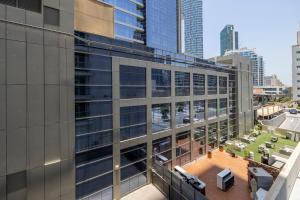 an aerial view of a building in a city at Cozy Yet Stylish Unit Studio One Marina in Dubai