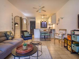 a living room with a couch and a table at Apartment Nueva Playa-1 by Interhome in Les Deveses	