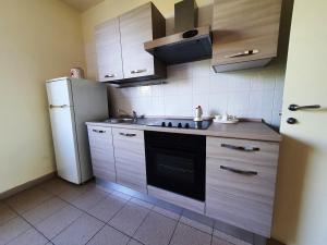 Cucina o angolo cottura di Via Ugento Apartments - a pochi passi dalle spiagge