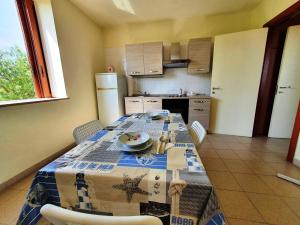 Cucina o angolo cottura di Via Ugento Apartments - a pochi passi dalle spiagge