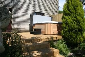 Billede fra billedgalleriet på Barn Cottage - Farm Park Stay with Hot Tub i Swansea