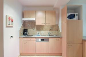 Kuchyňa alebo kuchynka v ubytovaní Apartments Christa App B1