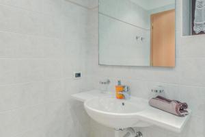Kúpeľňa v ubytovaní Apartments Christa App B1