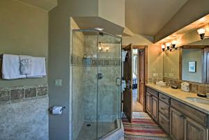 a bathroom with a shower and a sink at Beautiful Breck Retreat Walk to Gondola and Main St in Breckenridge +20 photos