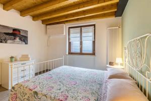 Ein Bett oder Betten in einem Zimmer der Unterkunft Le Pleiadi Alcione