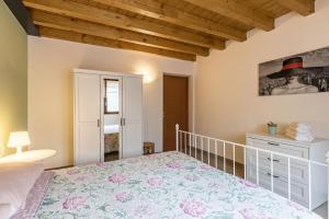 Ein Bett oder Betten in einem Zimmer der Unterkunft Le Pleiadi Alcione