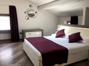 Voodi või voodid majutusasutuse Hotel Corte Del Paggio toas