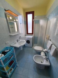 Bagno di Via Ugento Apartments - a pochi passi dalle spiagge