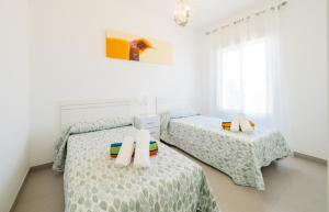 Posteľ alebo postele v izbe v ubytovaní Cubo's Villa Pilar + 36 fotografií