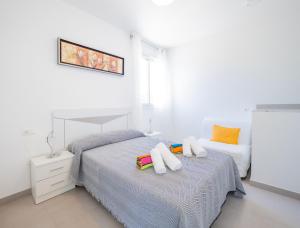 Posteľ alebo postele v izbe v ubytovaní Cubo's Villa Pilar
