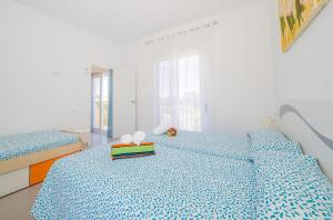 Posteľ alebo postele v izbe v ubytovaní Cubo's Villa Pilar