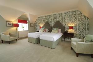 Ein Bett oder Betten in einem Zimmer der Unterkunft Leeds Castle Stable Courtyard Bed and Breakfast