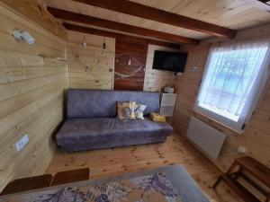 Posedenie v ubytovaní Siedlisko nr 4E i 4F nad jeziorem Skarlińskim, jezioro, mazury, domki letniskowe, bania