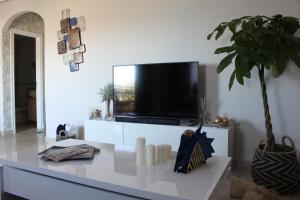 TV a/nebo společenská místnost v ubytování LUBINA DEL SOL