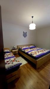A bed or beds in a room at Vila Devana