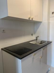 Kuchyňa alebo kuchynka v ubytovaní Apartments Villa Ohana