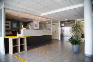 Vstupní hala nebo recepce v ubytování Kyriad Direct Arras - Saint-Laurent-Blangy - Parc Expo