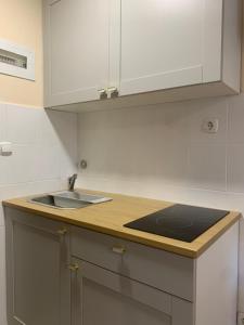 Kuchyňa alebo kuchynka v ubytovaní Apartments Villa Ohana