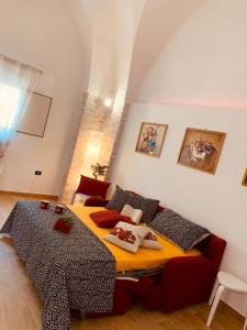 a bedroom with a bed in a room at Perla Barocca Centro Storico Mesagne in Mesagne
