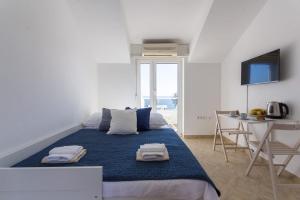 Posteľ alebo postele v izbe v ubytovaní Studio Apartman Blue View