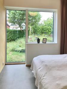 Postel nebo postele na pokoji v ubytování Villa Stjerneklar