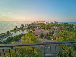 a view of the water from a balcony at Velier Summer Apartment in Mamaia