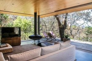 Et tv og/eller underholdning på Exclusive Ranch in Valle de Bravo with Pool