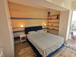 Ein Bett oder Betten in einem Zimmer der Unterkunft Velier Summer Apartment