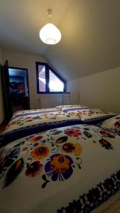 A bed or beds in a room at Vila Devana