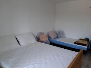 Postel nebo postele na pokoji v ubytování Apartment Karlo