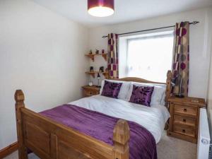 Ένα ή περισσότερα κρεβάτια σε δωμάτιο στο Meirionfa base for Snowdon