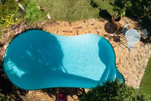 A view of the pool at ZenCapeTown Holiday House or nearby