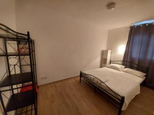 a bedroom with a bunk bed and a ladder at Frane Apartment in Zavalatica