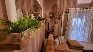 Ein Sitzbereich in der Unterkunft BeachHouse