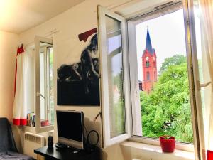 Televízia a/alebo spoločenská miestnosť v ubytovaní ART mieszkanie blisko dworca PKP Walbrzych Miasto
