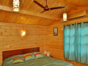 Postel nebo postele na pokoji v ubytování Santonio Resorts