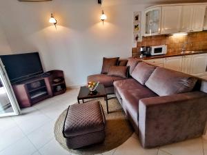 Kuchyň nebo kuchyňský kout v ubytování Apartments Villa Marid